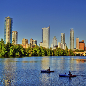Downtown Austin picture with kayaking on water in foreground