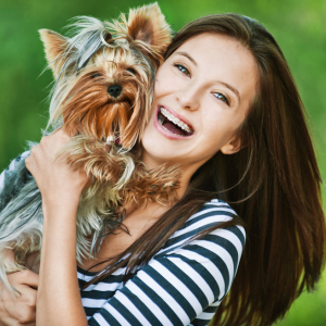 Happy Woman holding happy dog