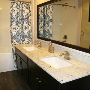Loft dual vanity sink with granite counters